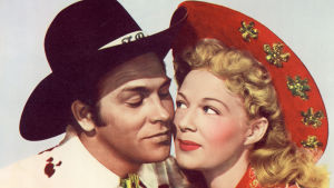 Howard Keel ja Betty Hutton elokuvan Annie mestariampuja mainoskuvassa