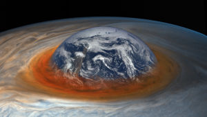 Konstnären har placerat in jorden i Jupiters stora röda fläck för att illustrera storleksförhållandena. Den stora röda fläcken på Jupiter, med jorden insatt som referens.