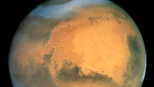 Planeten Mars är solsystemets näst minsta planet. Enligt en teori har livet kommit till Jorden härifrån.
