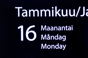 Suurennuskoneen kuva kalenterista, josta näkyy päivämäärä.