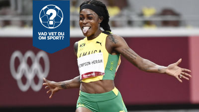 Elaine Thompson-Herah löper i mål och grimaserar.
