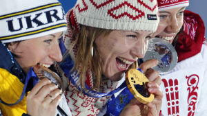 Vita Semerenko (t.v.) vann två medaljer i OS i Sotji 2014. Vita Semerenko, Anastasiya Kuzmina, Olga Viluhina, OS i Sotji 2014.