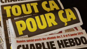 Rättegången inleds i Charlie Hebdo-fallet. Tidningsrubrik "Allt detta på grund av detta"
