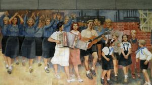 Sosialistista realismia edustava seinämaalaus Itä-Berliinistä