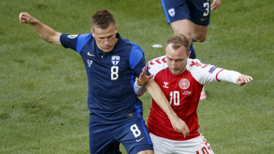 Suomen Robin Lod ja Tanskan Christian Eriksen.