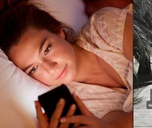 Småleende kvinna ligge ri säng och ser på sin telefon, i bakgrunden en sovande man
