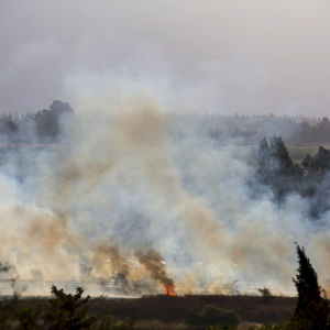 En brand efter att raketer som avfyrats från den syriska delen av Golanhöjderna den 20 augusti landade i norra Israel uran att orsaka personskador.