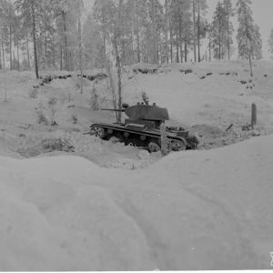 Kollaanjoen itäp. venäl. hv. etenee kiivaasti ampuen. 17-12-39.
