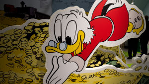 An image shows the cartoon Scrooge McDuck diving into coin piles at the Erika-Fuchs-Haus in Schwarzenbach an der Saale, Germany, 28 July 2015. The first German comic museum is set to open in Schwarzenbach on 01 August.