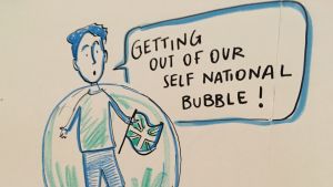 Nasheed säger att valet av Trump hjälper oss att komma ut ur vår bubbla. Del av ett konstverk med en text som säger "Getting out of our self national bubble!".