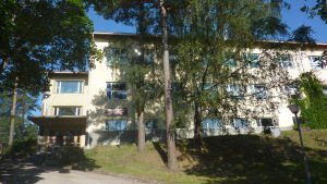 Den finskspråkiga skolan i Pojo kyrkoby. Pojo kyrkobys finskspråkiga skola