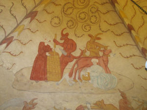 Lohjan kirkon asehuoneen holviin maalattu kuva, jossa noita lypsää paran avustamana lehmää. Vieressä toinen nainen kirnuaa voiksi vierellään olleen paran varastamaa maitoa Murals of Saint Lawrence Church, Lohja, Finland