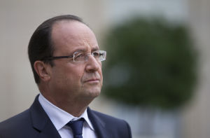 Rikemansskatten var ett av president François Hollandes vallöften. Hollande vid presidentpalatset i Paris den 10 oktober 2013