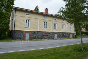 Hus i Dalsbruk med väg framför.