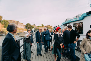 People disembarking from a ferry boat on the deck at Suomenlinna.