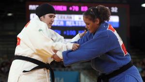 Saudiarabiska Wojdan Shaherkani tävlar mot Melissa Mojica från Puertorico i judo i OS i London. Wojdan Shaherkani tävlar mot Melissa Mojica i judo.