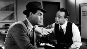Fred MacMurray ja Edward G. Robinson elokuvassa Nainen ilman omaatuntoa (1944).