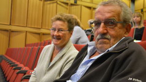 Rosveig och Eivind Nyholm ville höra det senaste om vårdreformen. Man och kvinna sitter i auditorium.