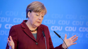 Angela Merkel 9.1.2016 på en presskonferens om hårdare utvisningsregler