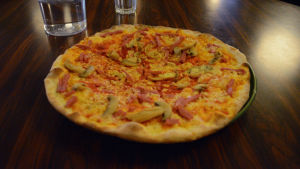 En pizza som kostat 3,90€.
