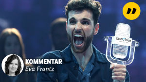 Nederländerna fick vänta i 44 år på en ny seger sedan Ding-a Dong. Här Duncan Laurence efter vinsten i Eurovision Song Contest i Tel Aviv 2019. En glad man håller i en statyett. På bilden är ett litet ansikte av en kvinna och texten kommentar Eva Franz.