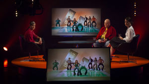 Sångaren Jannika B ger poäng till Rysslands bidrag. De Eurovisa Johan Lindroos och Eva Frantz med sångaren Jannika B tittar på Rysslands Eurovisionsbidrag.