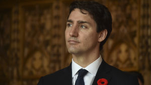 Justin Trudeau har fört fram sig som en fördomsfri politiker som kämpar för ett mångkulturellt Kanada Kanadas premiärminister Justin Trudeau iklädd kostym.