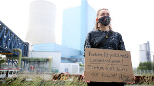 Protest mot Datteln 4 i Tyskland. Kvinna demonstrerar mot Fortumägda energijätten Unipers planer att starta kolkraftverket Datteln 4 i Tyskland.