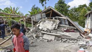   Sunday's earthquake required at least 16 deaths while hundreds of buildings were destroyed 