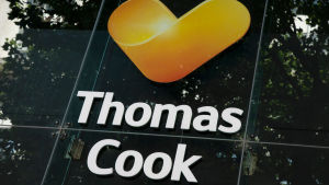 Thomas Cooks logo med mörkgrön bakgrund. 