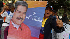 Människor demonstrerar på den internationella kvinnodagen 8.3.2019 och visar samtidigt sitt stöd för den legitima presidenten Nicolás Maduro Människor demonstrerar på den internationella kvinnodagen 8.3.2019 och visar samtidigt sitt stöd för den legitima presidenten Nicolás Maduro