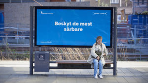 Skydda de mest sårbara, heter det på en skylt i coronavirusdrabbade Köpenhamn.