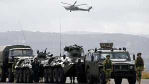 Putin meddelade om en partiell reträtt från Syrien i ett tal på flygbasen Hmeymin i nordvästra Syrien Rysk flygbas i Syrien, flygbas, ryssland, syrien