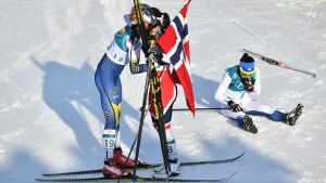 Stina Nilsson, Marit Björgen och Krista Pärmäkoski, OS 2018.