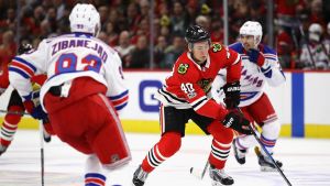Chicagos John Hayden gjorde Chicagos tredje mål. Chicago-spelaren John Hayden utmanar motståndarna.