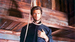 Hyvät, pahat ja rumat. Clint Eastwood kuvassa hirttosilmukka löysästi kaulan ympärillä.