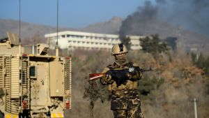 Kabul har utsatts för tre förödande terrordåd på en vecka. En medlem i polisens antiterrorstyrka patrullerar utanför Hotell Intercontinental som angreps av talibankrigare. Explosion i Afghanistan