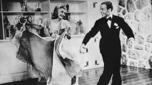 Ginger Rogers och Fred Astaire i filmen Swing Time (1936). Ginger Rogers och Fred Astaire dansar och ser skrattande på varandra i filmen Swing Time.