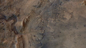 Meteoritkratern Jezero var en gång hem för en sjö och ett floddelta, vars spår ännu syns klart på bilden. Meteoritkratern Jezero på Mars.