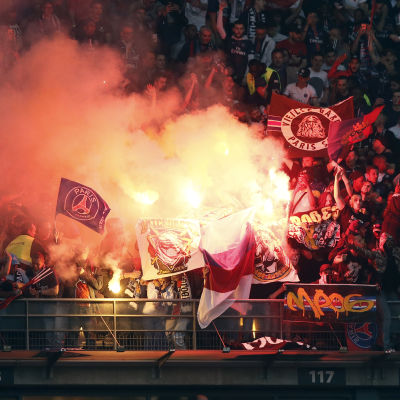 PSG supporters light flares during the Coupe de France final match between Paris Saint Germain (PSG) and Olympique of Marseille (OM) at the Stade de France in Saint-Denis outside Paris, France, 21 May 2016