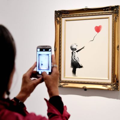 Banksys tavla Girl with a balloon.