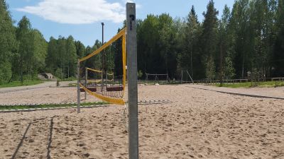 Volleybollplan med sand.