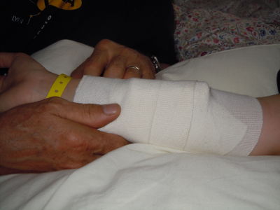 Bandage på arm.