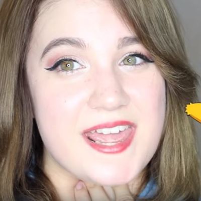 Jenny Pitkänen imitoimassa Pikachua.