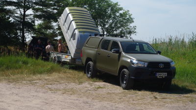 Armens bil på strand