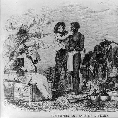 Afrikansk slav inspekteras av vit slavhandlare