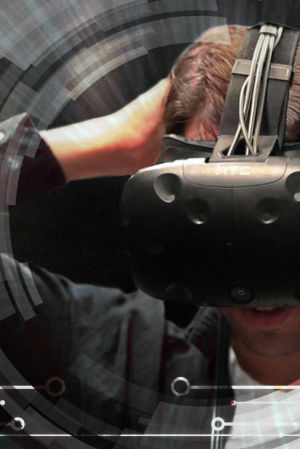 Graafisesti käsitelty kuva, jossa miehellä VR-lasit päässä