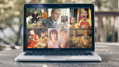 En laptop på ett bord, på skärmen ser man bilder från filmen Mannen utan minne, serier Kommissarie Lewis, Kentä laidalla, Bärtil, Aikuiset och Sommaren 85.