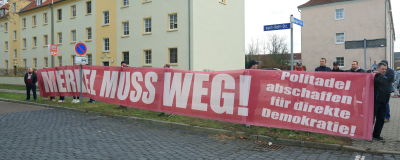 En demonstration mot Angela Merkel