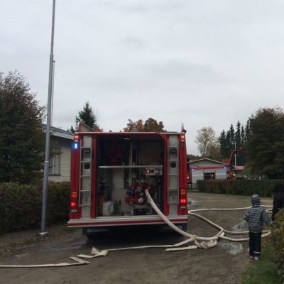 paloauto ja talo